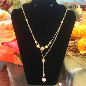 Robert rose necklaces.